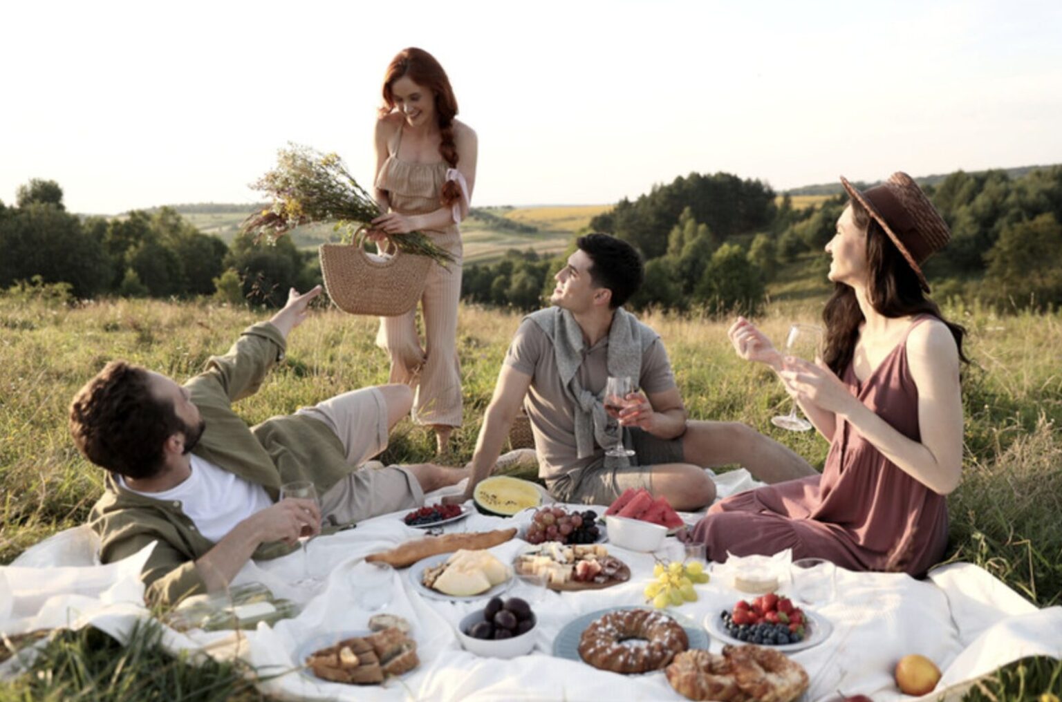 Four people having a picnic